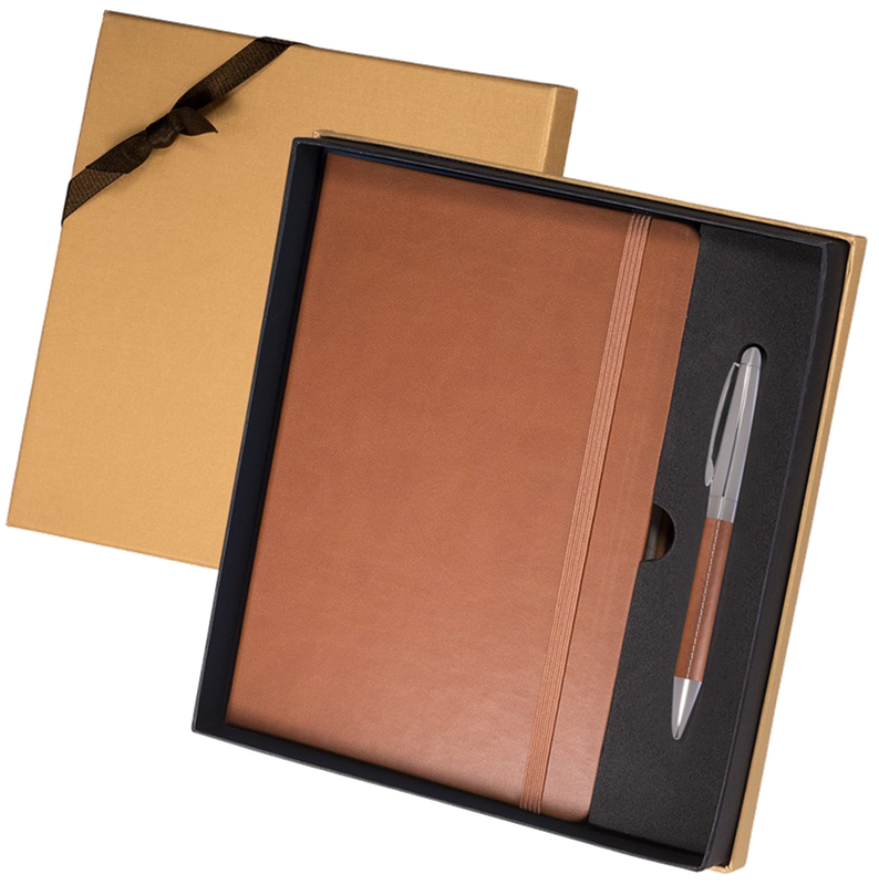 Brown Tuscany journal and matching pen in an open gift box, with a ribboned lid behind.