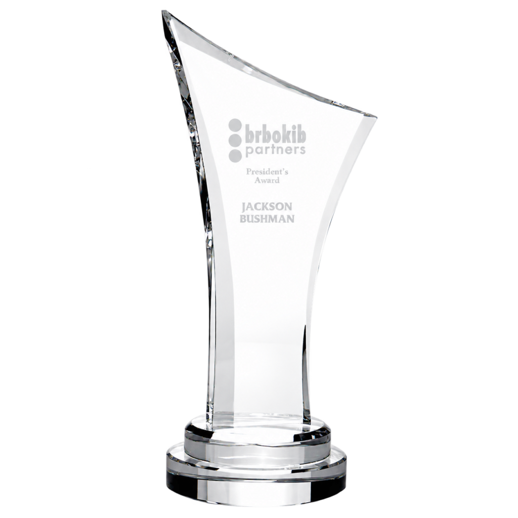 Clear Number One Award with a curved, slanted top, sample engraving and a round stepped base.