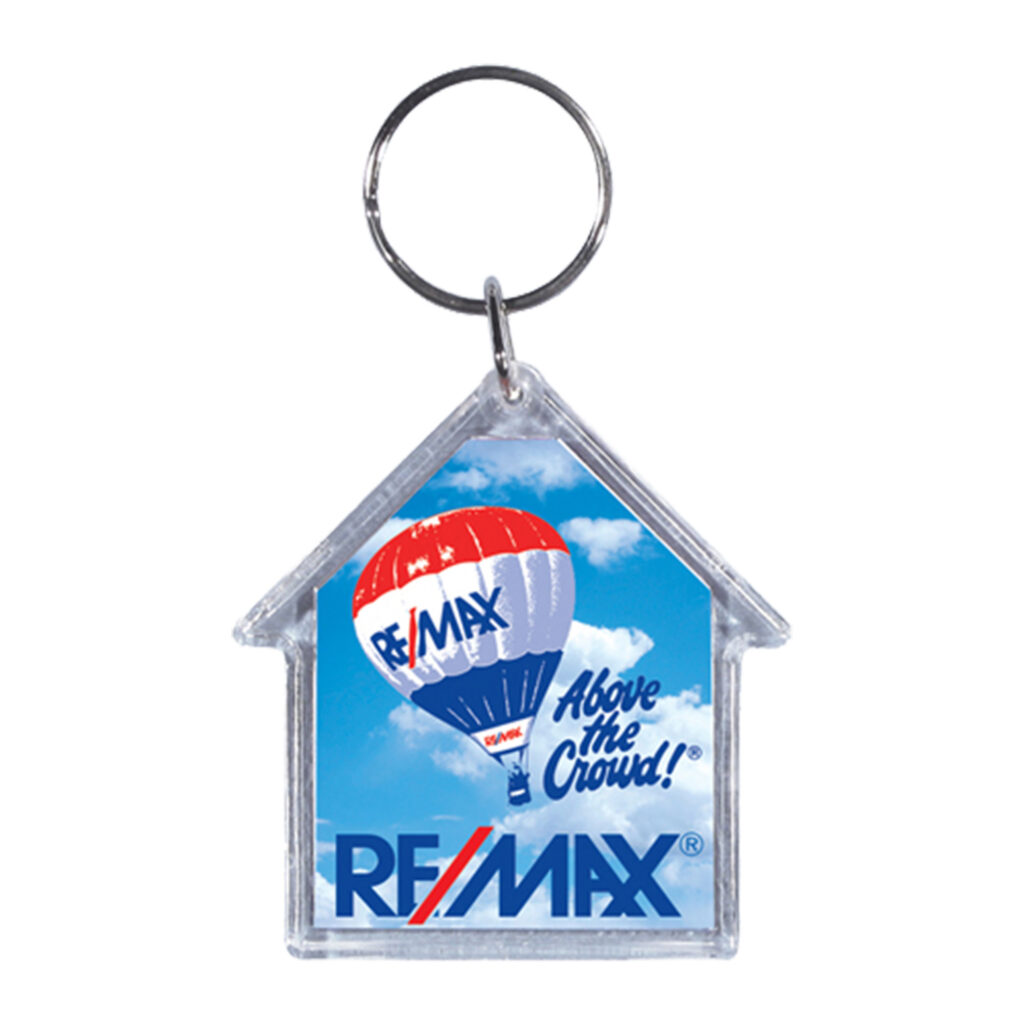 Clear house-shaped acrylic keytag with RE/MAX sample artwork and a silver split ring.